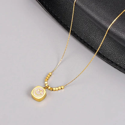 HAPPY FACE NECKLACE